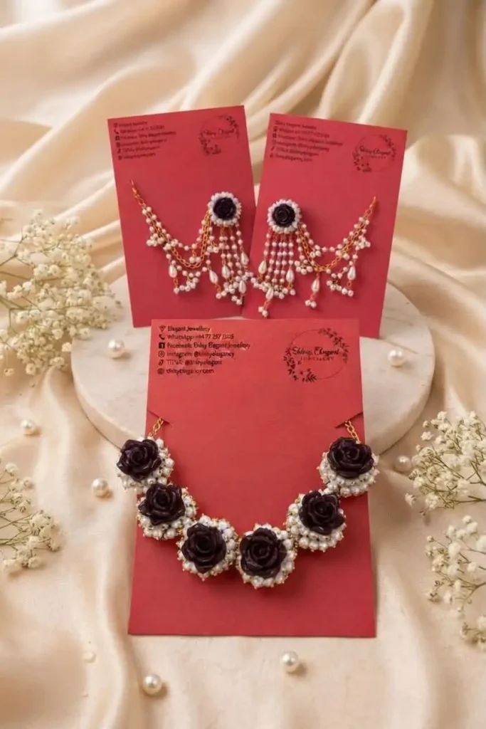 Dark rose and pearl necklace paired with matching dangling pearl earrings